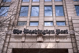 A sign for the Washington Post is seen at the company's offices, Monday, Jan. 26, 2026, in Washington.  