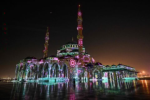 Sharjah Mosque glows in vibrant colours during the 15th Sharjah Light Festival.