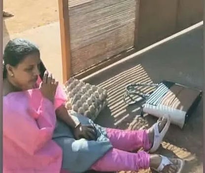 Sindhu S Nair sat in protest at the school gate in Neduvathur, in Kottarakkara on Wednesday.