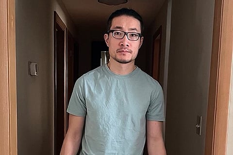 Chinese national Guan Heng, 38, shown, Wednesday, Feb. 4, 2025 in Binghamton, New York, has been released from federal detention, nearly one week after an immigration court granted him asylum because the court ruled the man had a well-founded fear of persecution if sent back to China after exposing human rights abuses there. (AP Photo/Luo Yun)