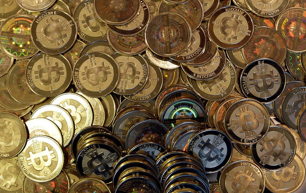 Bitcoin tokens are seen on April 3, 2013, in Sandy, Utah. (AP Photo/Rick Bowmer, File)
