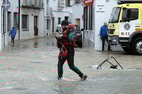 Emergency personnel get ready to carry out a total evacuation of the town of Grazalema, southern Spain, on February 5, 2026, amid Storm Leonardo.