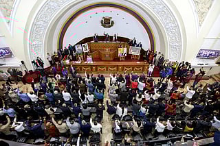 Members of Venezuela's National Assembly vote to approve the amnesty bill proposed by Venezuela's interim president, Delcy Rodríguez, in Caracas, on February 5, 2026.