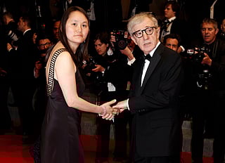 Filmmaker Woody Allen, right, and Soon-Yi Previn arrive for an event in Cannes, southern France, May 15, 2010. 