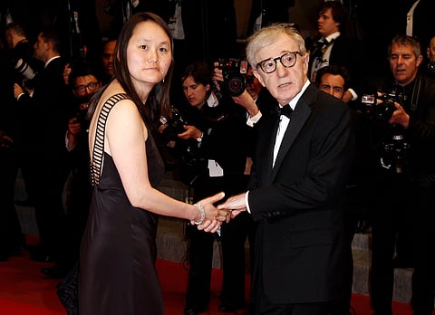 Filmmaker Woody Allen, right, and Soon-Yi Previn arrive for an event in Cannes, southern France, May 15, 2010. 