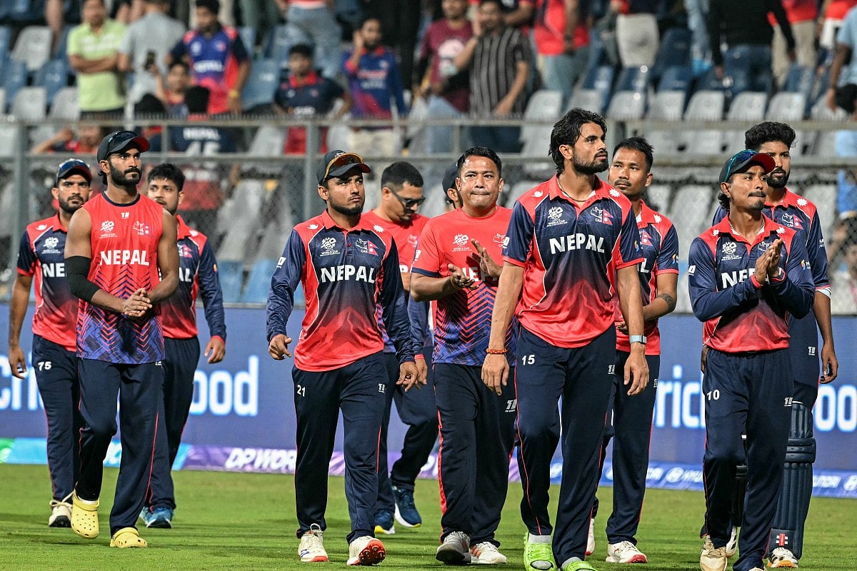 Nepal's players take a lap of honour around the field at the end of the 2026 ICC Men's T20 Cricket World Cup group stage match between England and Nepal at the Wankhede Stadium in Mumbai on February 8, 2026.