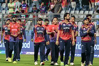 Nepal's players take a lap of honour around the field at the end of the 2026 ICC Men's T20 Cricket World Cup group stage match between England and Nepal at the Wankhede Stadium in Mumbai on February 8, 2026.