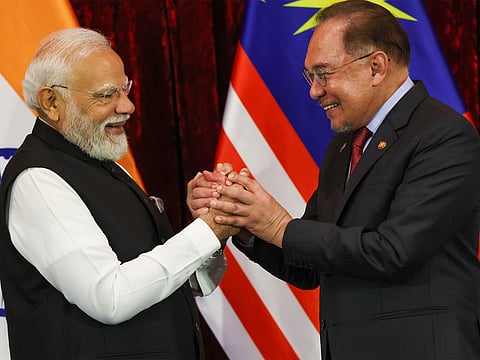 Prime Minister Narendra Modi with his Malaysian counterpart Anwar Ibrahim.