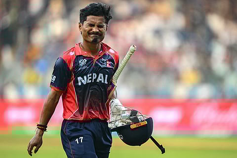 Nepal's captain Rohit Paudel reacts as he walks back to the pavilion after his dismissal during the 2026 ICC Men's T20 Cricket World Cup group stage match between England and Nepal at the Wankhede Stadium in Mumbai on February 8, 2026.