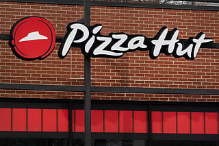 Under the deal, Yum China Holdings will acquire Pizza Hut's mainland China operations for $1.2 billion, while private equity firm LongRange Capital will purchase the remainder of the business for $1.5 billion.