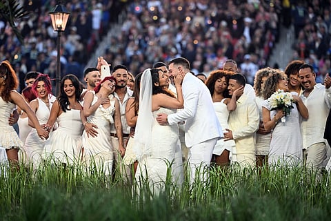 Performers portray a wedding during Puerto Rican singer Bad Bunny performance during Super Bowl LX Patriots vs Seahawks Apple Music Halftime Show at Levi's Stadium in Santa Clara, California on February 8, 2026.