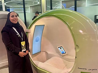 Dr Maryam Al Mheiri of DHA explains the features of the ‘Tawazun Pod,’ which will help residents destress in just three minutes, at the World Health Expo in Dubai on Monday.