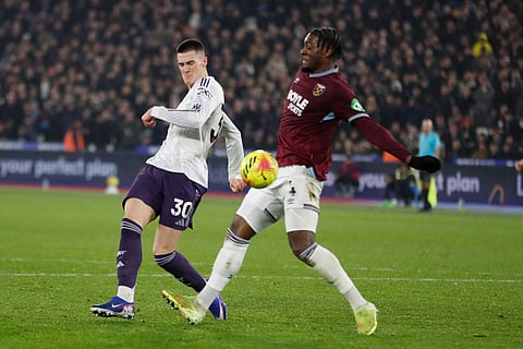 Manchester United's Slovenian striker #30 Benjamin Sesko (L) scores their first goal during the English Premier League football match between West Ham United and Manchester United at the London Stadium in east London on February 10, 2026.