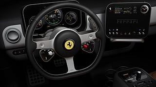 At first glance, the Ferrari Luce’s interior looks calm, even minimal. A three-spoke steering wheel. A clean instrument binnacle. 
