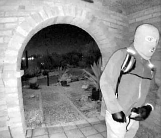 A masked man in this CCTV footage screengrab is a key suspect in the kidnapping of Nancy Guthrie, 84, from her Texas home.