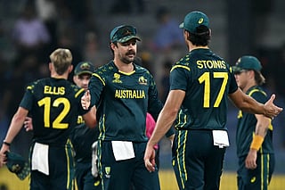 Australia's captain Travis Head (C) celebrates with teammates their team's win at the end of the 2026 ICC Men's T20 Cricket World Cup group stage match between Ireland and Australia at R Premadasa Stadium in Colombo on February 11, 2026.