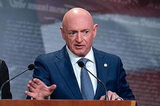 Sen. Mark Kelly, D-Arizona, speaks during a news conference at Capitol Hill, Wednesday, Feb. 11, 2026, in Washington.