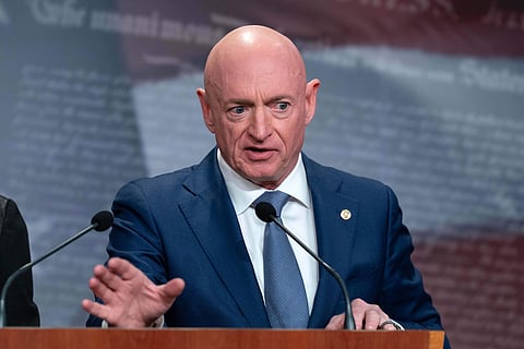 Sen. Mark Kelly, D-Arizona, speaks during a news conference at Capitol Hill, Wednesday, Feb. 11, 2026, in Washington.