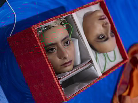 Shaikha Al Ketbi’s 'Book' features a character wearing an upside-down mask – a replica of the artist’s own face.