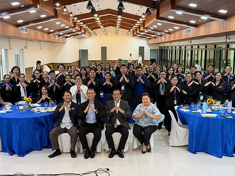 Year-end performance assessment and corporate planning session by the Department of Migrant Workers held in Makati, Philippines.