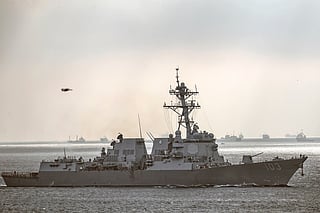 FILE - U.S. warship the USS Truxtun sails in Bosporus Strait en route to the Black Sea, in Istanbul, Turkey, March 7, 2014. 