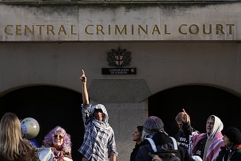 Protesters demonstrate outside The Old Bailey court in London, where four Palestine Action activists are to appear in court charged over a break-in at RAF Brize Norton on June 20 in which aircraft were damaged with spraypaint, Friday, Jan. 16, 2026.