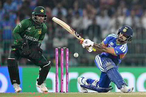 India's Ishan Kishan (R) plays a shot during the 2026 ICC Men's T20 Cricket World Cup group stage match between India and Pakistan at the R Premadasa Stadium in Colombo on February 15, 2026.