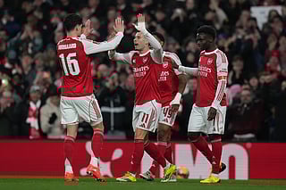 Arsenal's Gabriel Martinelli, center, celebrates with teammates after scoring their side's second goal during the English FA Cup soccer match between Arsenal and Wigan Athletic in London, Sunday, Feb. 15, 2026.