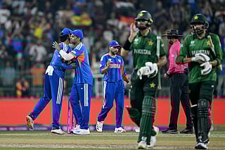 India's captain Suryakumar Yadav (2L) and Tilak Varma (L) celebrate their team's win against Pakistan at the end of the 2026 ICC Men's T20 Cricket World Cup group stage match in the R Premadasa Stadium in Colombo on February 15, 2026.