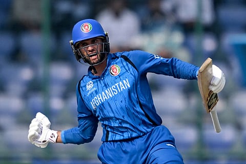 Afghanistan's Azmatullah Omarzai celebrates his team's win at the end of the 2026 ICC Men's T20 Cricket World Cup group stage match between Afghanistan and United Arab Emirates at the Arun Jaitley Stadium in New Delhi on February 16, 2026.