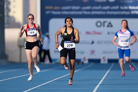 India's Preeti Pal (centre) in action in women's 100m T35 final at Dubai 2025 Grand Prix.