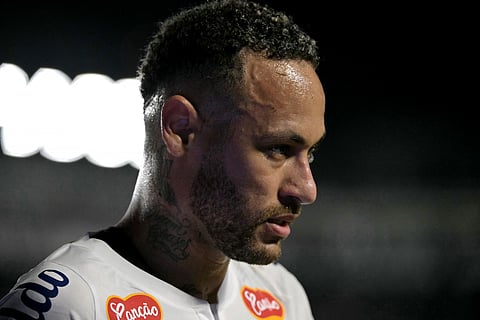 Santos' forward Neymar #10 looks on during the Campeonato Paulista football match between Santos and Botafogo de Ribeirao Preto at the Urbano Caldeira Stadium in Santos, Sao Paulo state, Brazil on February 5, 2025.