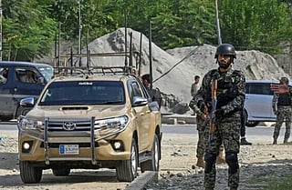Security personnel stand guard in Bajaur district of Khyber Pakhtunkhwa. 
