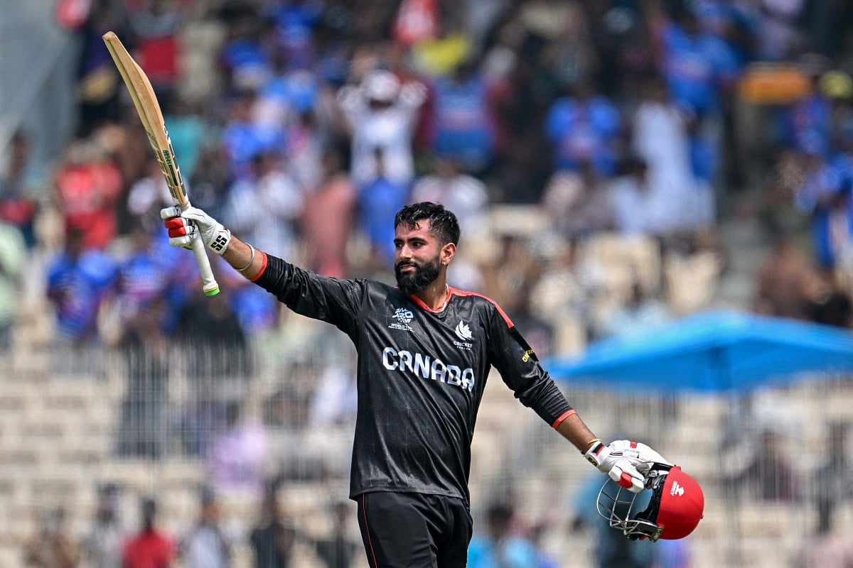 Canada's Yuvraj Samra celebrates after scoring a century (100 runs) during the 2026 ICC Men's T20 Cricket World Cup group stage match between Canada and New Zealand at the MA Chidambaram Stadium in Chennai on February 17, 2026.