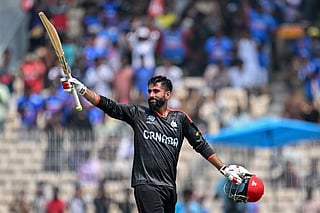 Canada's Yuvraj Samra celebrates after scoring a century (100 runs) during the 2026 ICC Men's T20 Cricket World Cup group stage match between Canada and New Zealand at the MA Chidambaram Stadium in Chennai on February 17, 2026.