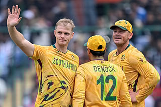 South Africa's Corbin Bosch (L) celebrates with teammates after taking the wicket of UAE's Sohaib Khan during the 2026 ICC Men's T20 Cricket World Cup group stage match between South Africa and United Arab Emirates at the Arun Jaitley Stadium in New Delhi on February 18, 2026.