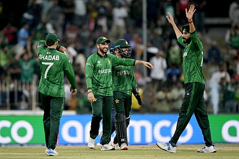 Pakistan's Usman Tariq (R) celebrates with captain Salman Agha (2L) and teammates after their victory against Namibia at the end of the 2026 ICC Men's T20 Cricket World Cup group stage match in the Sinhalese Sports Club (SSC) Ground, Colombo on February 18, 2026.