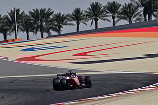 Ferrari's Monegasque driver Charles Leclerc drives on the first day of the Formula One pre-season testing at the Bahrain International Circuit in Sakhir on February 18, 2026.