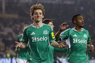 Gordon celebrates after scoring his side's first goal during the Champions League play-off first leg match between Qarabag and Newcastle