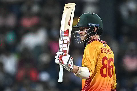 Zimbabwe's Brian Bennett celebrates after scoring a half-century (50 runs) during the 2026 ICC Men's T20 Cricket World Cup group stage match between Sri Lanka and Zimbabwe at the R Premadasa Stadium in Colombo on February 19, 2026.