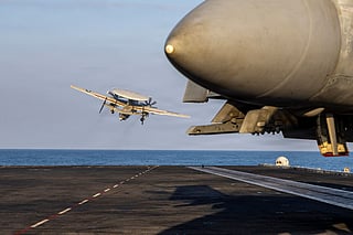 An E-2D Hawkeye, attached to Airborne Command and Control Squadron (VAW) 117, launches from the flight deck of Nimitz-class aircraft carrier USS Abraham Lincoln in the Arabian Sea.