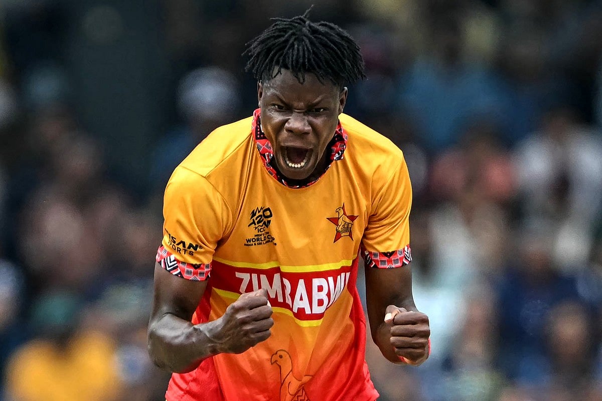 Zimbabwe's Blessing Muzarabani celebrates after taking the wicket of Sri Lanka's Kusal Perera during the 2026 ICC Men's T20 Cricket World Cup group stage match between Sri Lanka and Zimbabwe at the R Premadasa Stadium in Colombo on February 19, 2026.