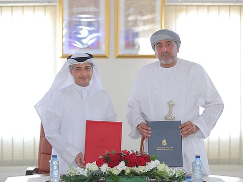 Said bin Sultan bin Yarub Al Busaidi and Ahmed bin Rakkad Al Ameri during the signing of the official agreement naming the Sultanate of Oman as Guest of Honour for the 45th Sharjah International Book Fair (SIBF).