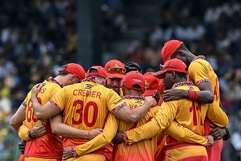 Zimbabwe's players huddle before the start of the 2026 ICC Men's T20 Cricket World Cup group stage match between Sri Lanka and Zimbabwe at the R Premadasa Stadium in Colombo on February 19, 2026.