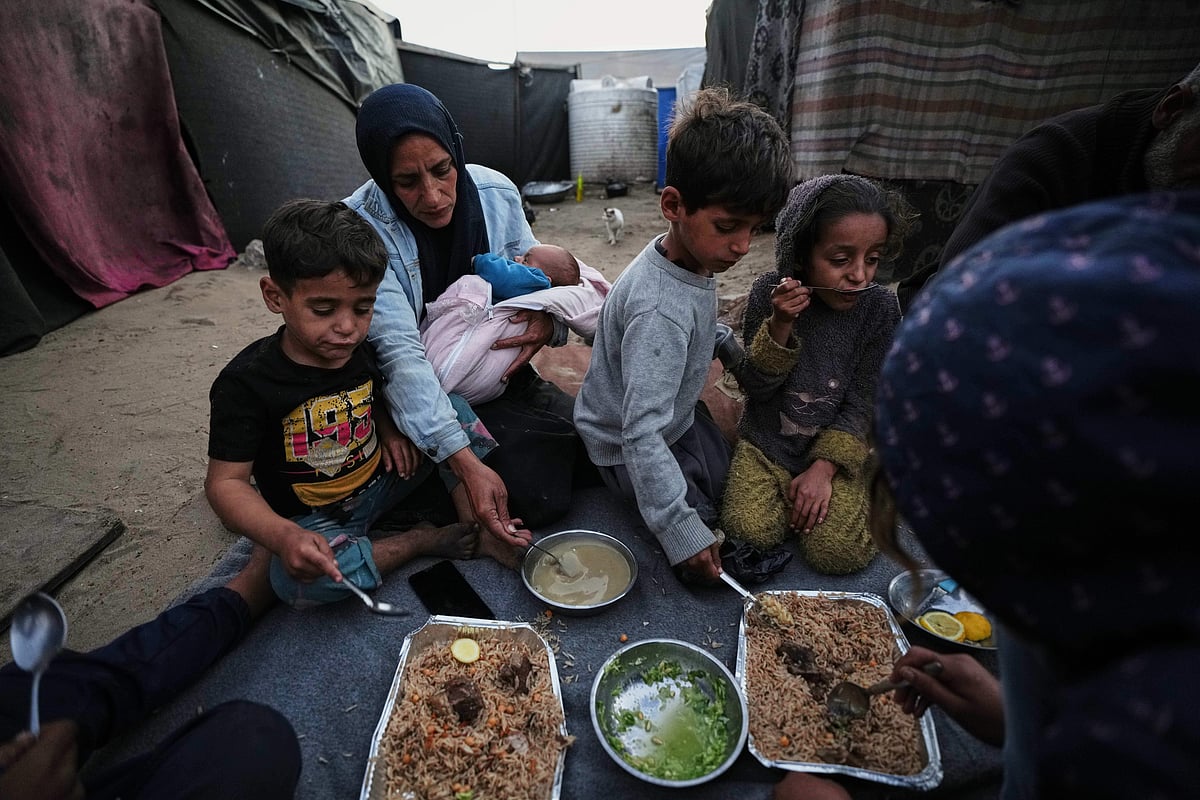 In Gaza City, Palestinians gathered for iftar during the holy month of Ramadan beside the rubble of destroyed residential buildings. 