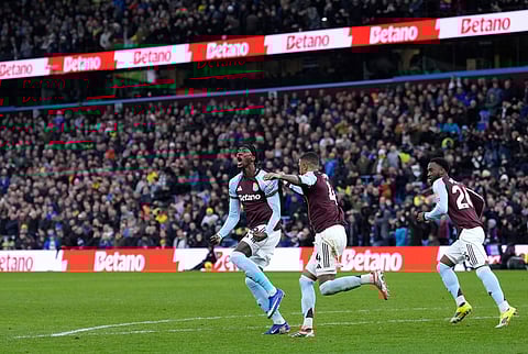 Aston Villa's Tammy Abraham celebrates scoring their side's first goal of the game during their English Premier League soccer match against Leeds United in Birmingham, England, Saturday, Feb. 21, 2026. 