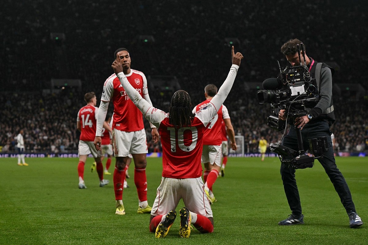 Arsenal's English midfielder Eberechi Eze (C) celebrates after scoring the team's third goal during the English Premier League football match between Tottenham Hotspur and Arsenal at the Tottenham Hotspur Stadium in London, on February 22, 2026.