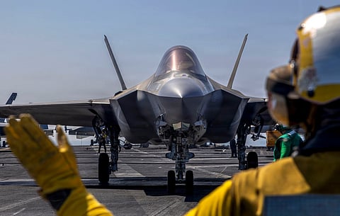 An F-35C Lightning II, attached to Marine Fighter Attack Squadron (VMFA) 314, as it prepares to launch from the flight deck of Nimitz-class aircraft carrier USS Abraham Lincoln (CVN 72) in the Arabian Sea.