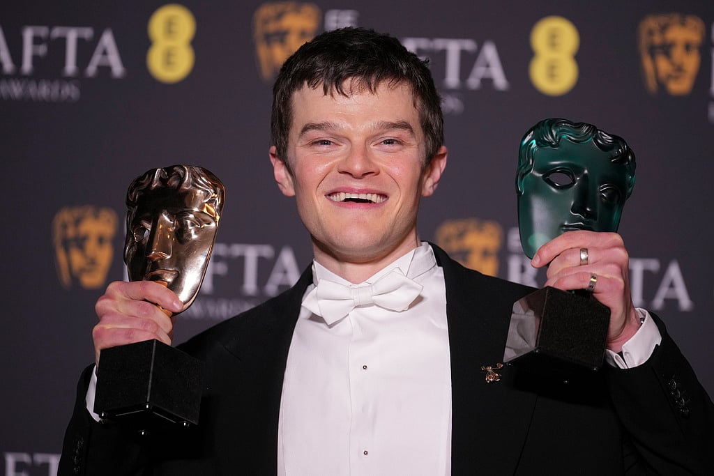 Robert Aramayo poses with the EE rising star award and the award for leading actor for 'I Swear' at the 79th British Academy Film Awards, BAFTA's, in London, Sunday, Feb. 22, 2026.