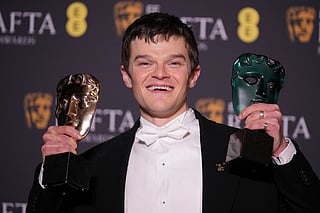 Robert Aramayo poses with the EE rising star award and the award for leading actor for 'I Swear' at the 79th British Academy Film Awards, BAFTA's, in London, Sunday, Feb. 22, 2026. 